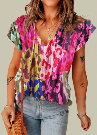 Ruffled Printed Tie Neck Cap Sleeve Blouse - MimiStylez