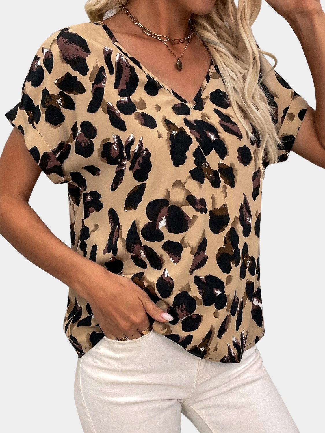 Blusa estampada de manga corta con cuello en V