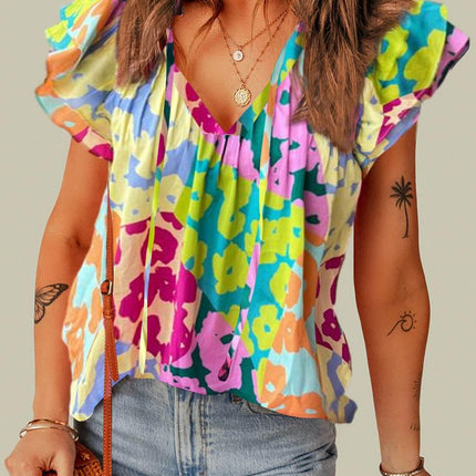 Ruffled Printed Tie Neck Cap Sleeve Blouse - MimiStylez