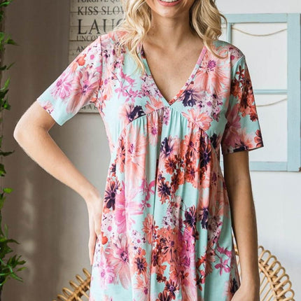 Heimish Full Size Floral V-Neck Short Sleeve Babydoll Blouse - MimiStylez