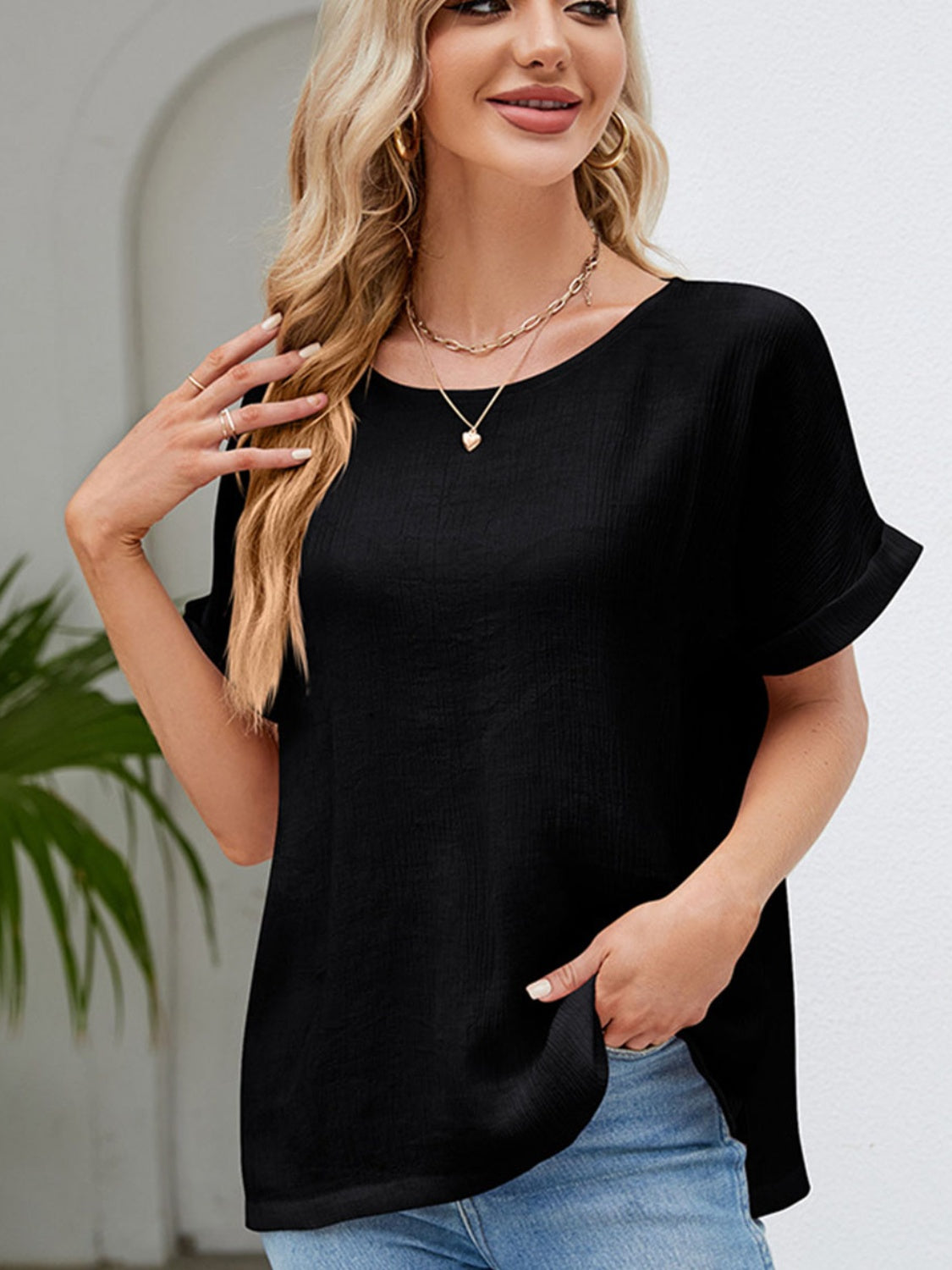 Blusa de manga corta con cuello redondo