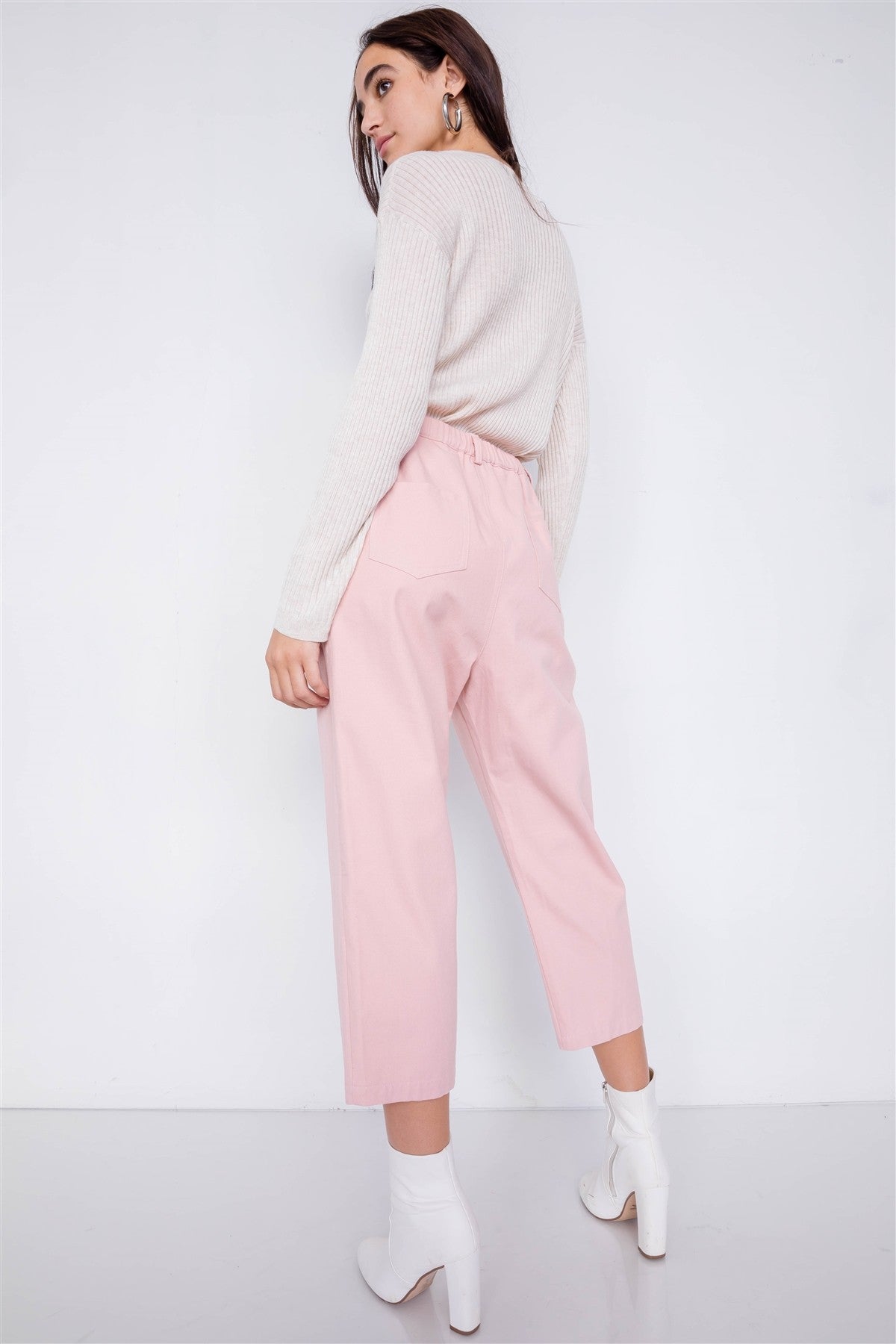 Pantalones de cintura con broche ajustable y pierna ancha con tobillo liso y elegante en colores pastel