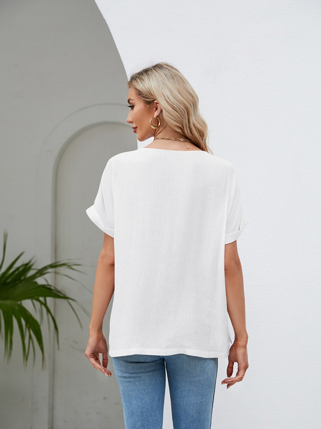 Blusa de manga corta con cuello redondo