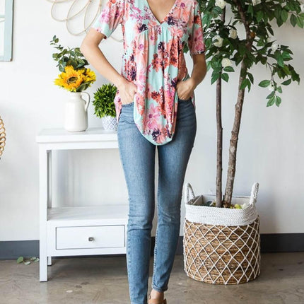 Heimish Full Size Floral V-Neck Short Sleeve Babydoll Blouse - MimiStylez