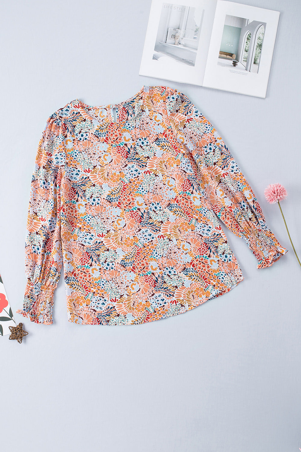 Blusa de manga larga con estampado floral